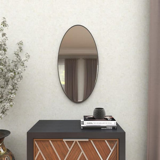 Litton Lane 31 in. x 18 in. Oval Shaped Round Framed Black Wall Mirror with Thin Minimalistic Frame 60149